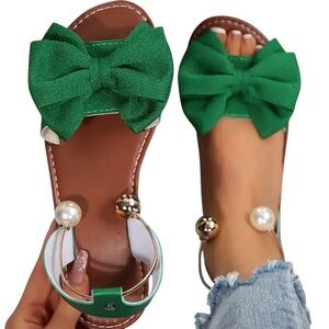 WOMENS FLAT BOW SANDALS WITH METAL & PEARL ANKLE DETAIL